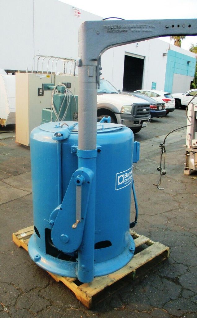 Barrett 1101-E spindle post type chip spinner with hoist.